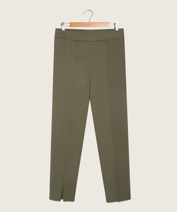 Leggings Unicolor Con Corte En Frente Y Abertura En Bota