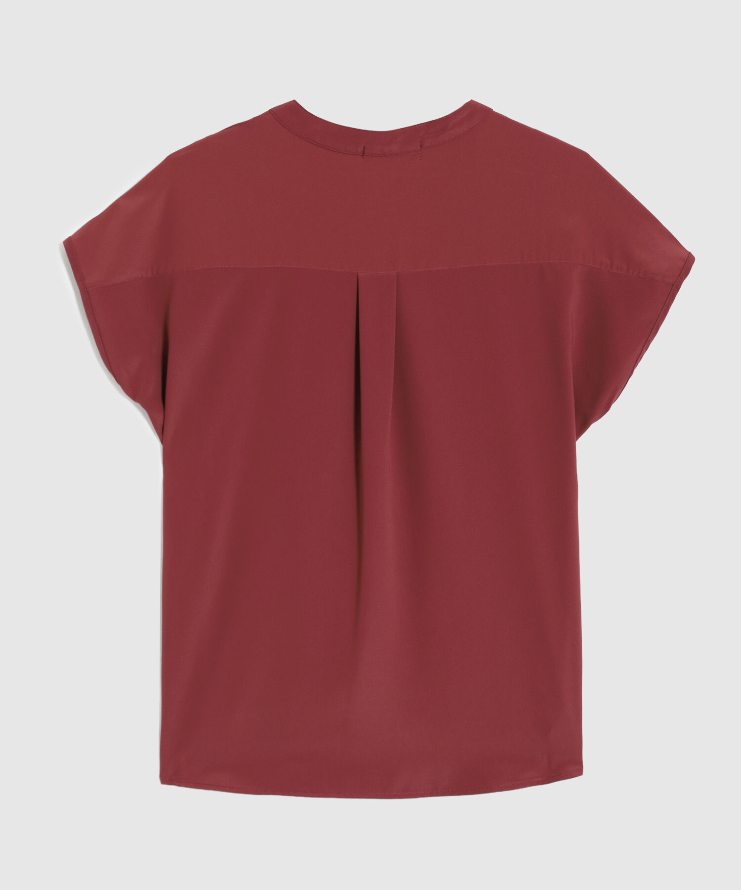 Blusa Unicolor Con Botones A Tono