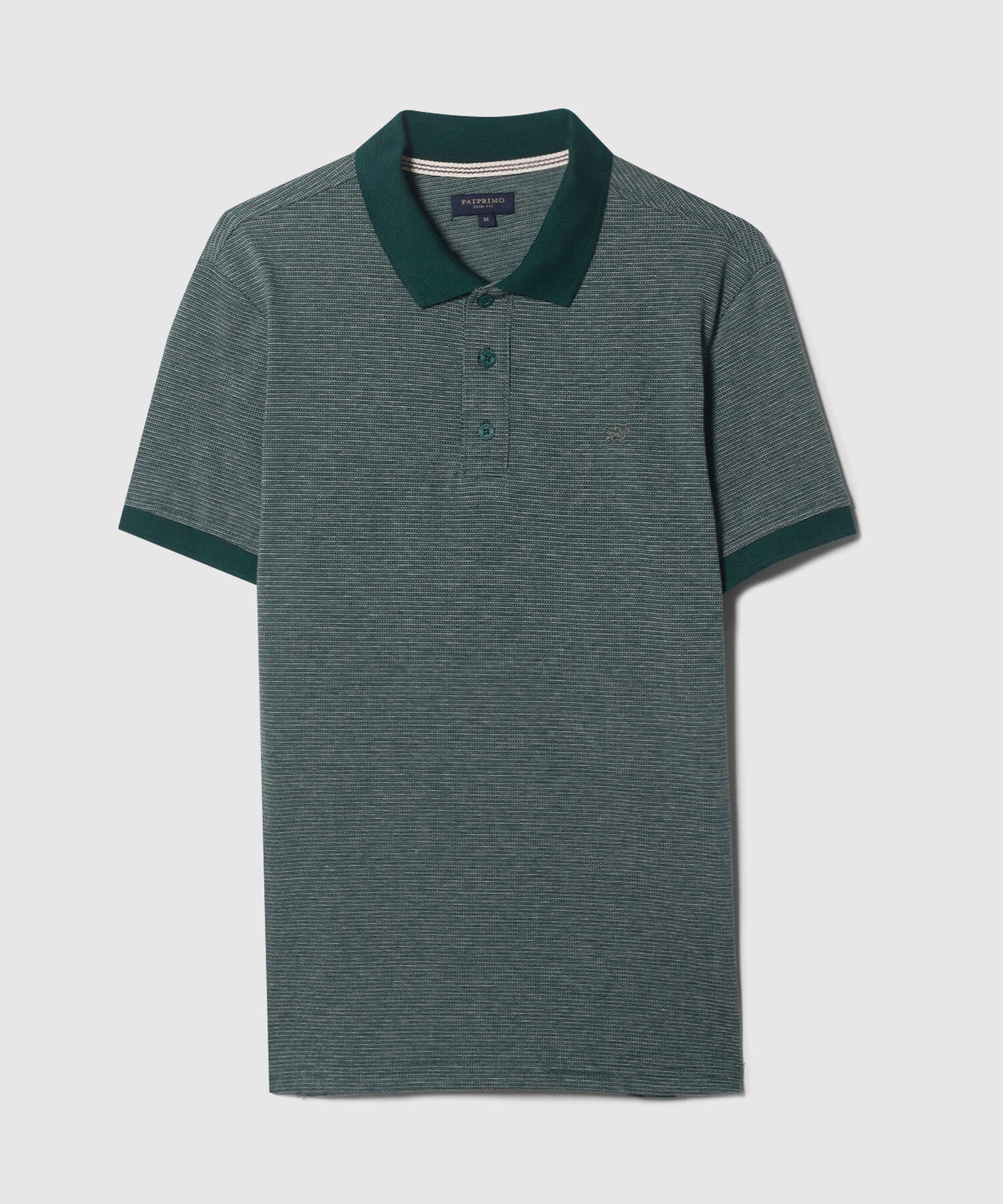 Polo Unicolor Con Textura, Cuello Y Puños Tejidos, Silueta Slim Fit, Lineas