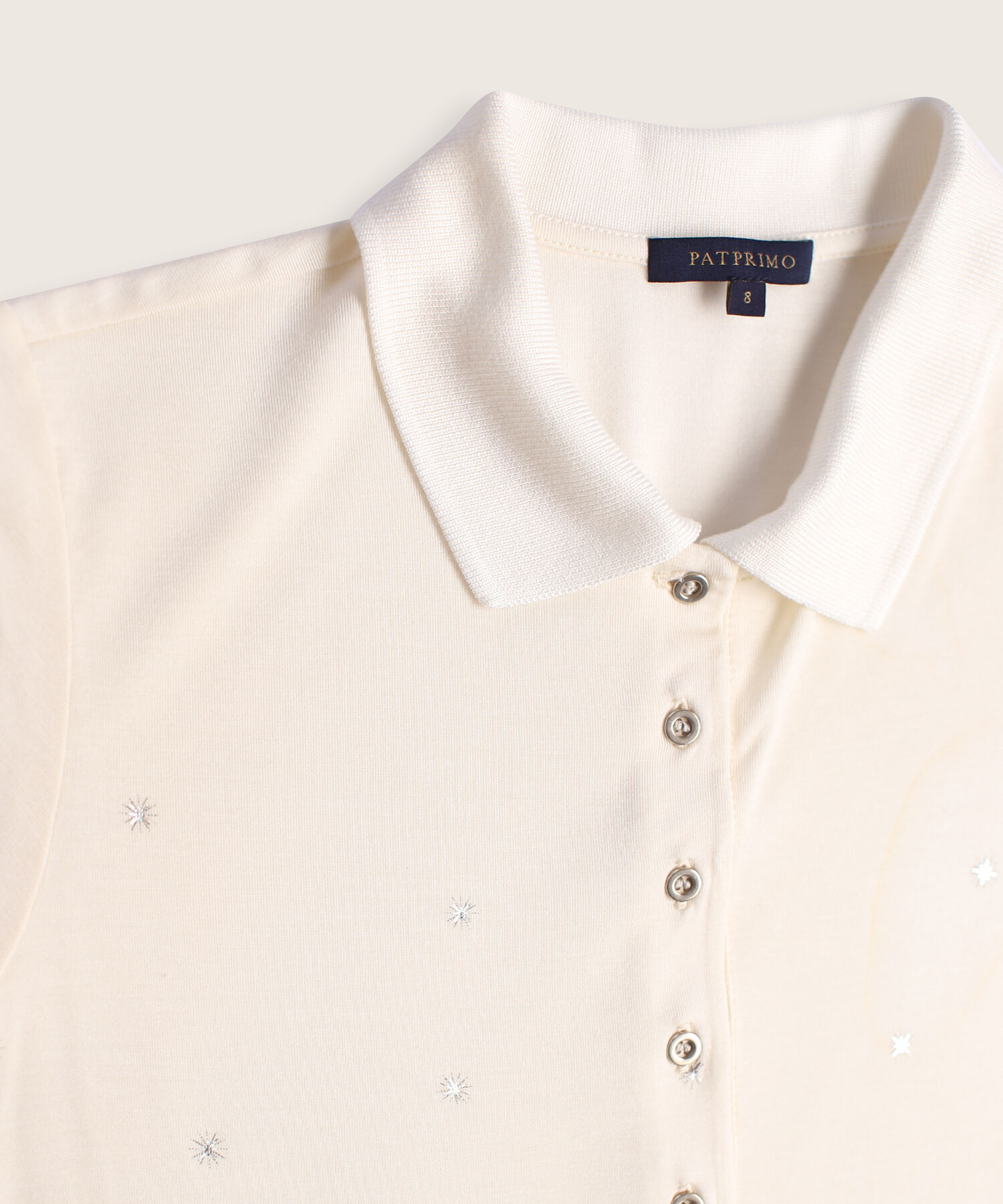 Polo con brillante