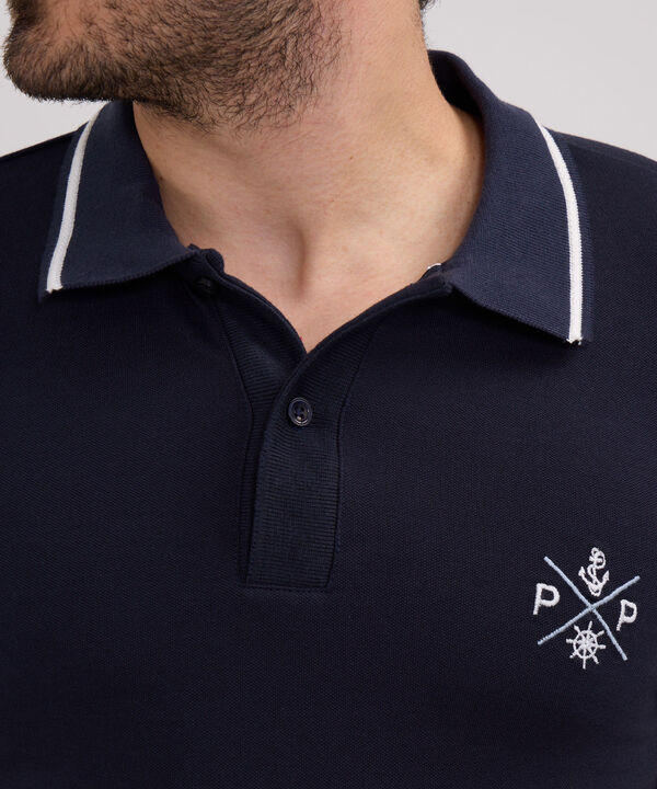 Polo Unicolor Con Bordado image number null
