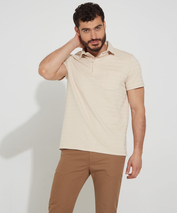 Polo Unicolor Textura, Cuello Maquina Duro Con Bolsillo Y Silueta Slim Fit