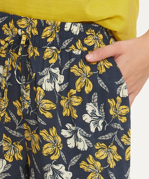 Pantalón Estampado Con Elástico En Cintura, Bolsillos Laterales Y Anudado Decorativo, Líneas