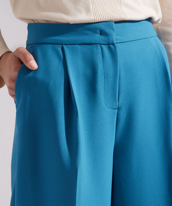 Pantalón Con Prenses  Bota Amplia Crudo