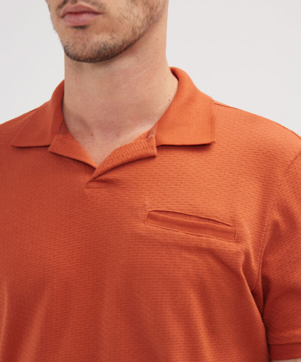Polo Unicolor Cuello Y Puños Tejidos image number null
