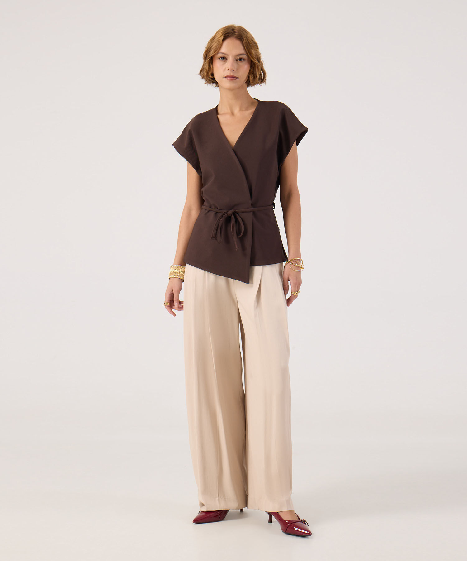 Blusa unicolor con cinturon 