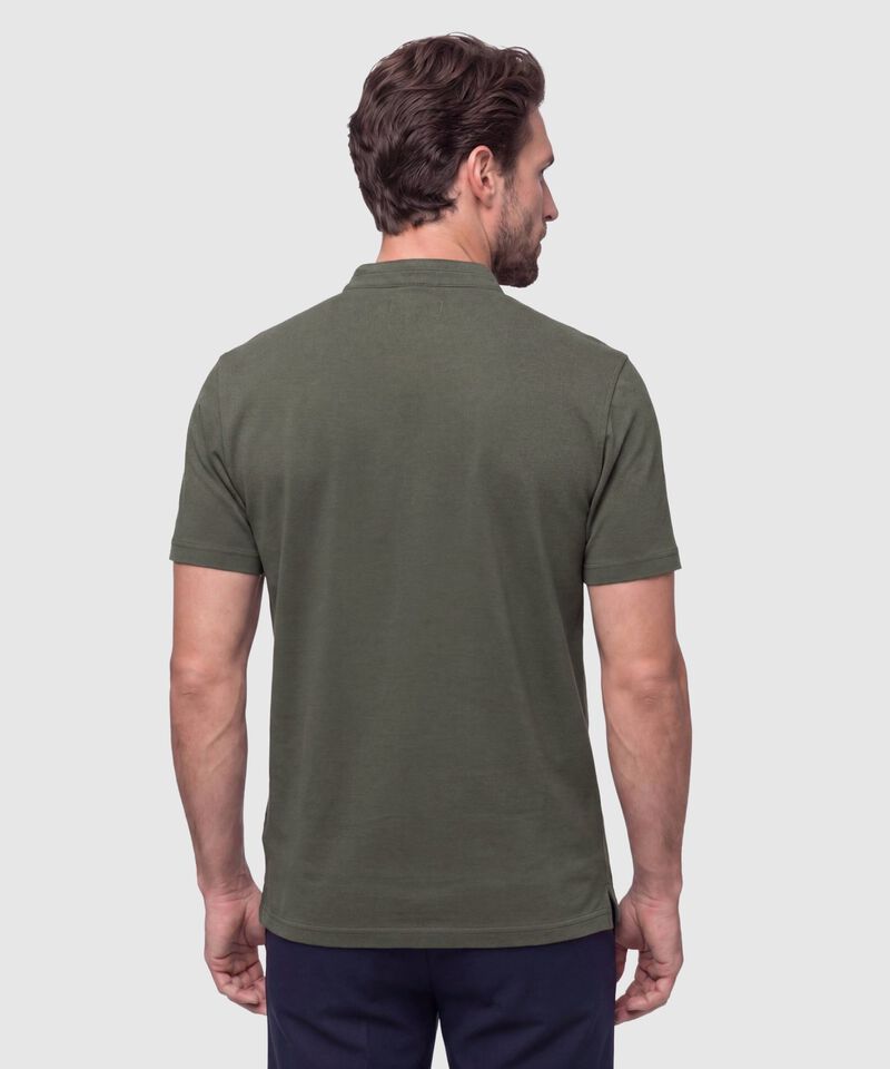 Polo Unicolor Con Bordado