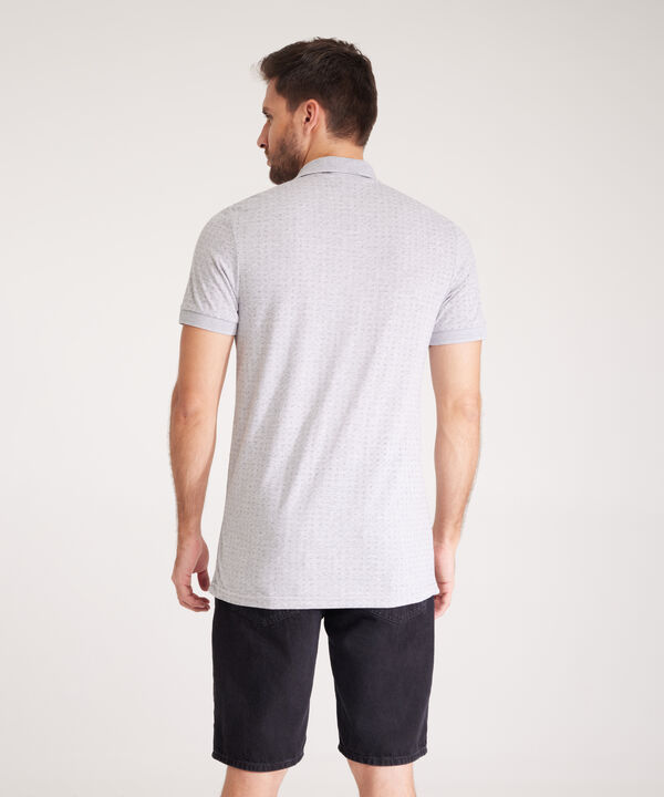 Polo Estampada Cuello Y Puños Tejidos Unicolor Sin Bolsillo Con Silueta Slim Fit