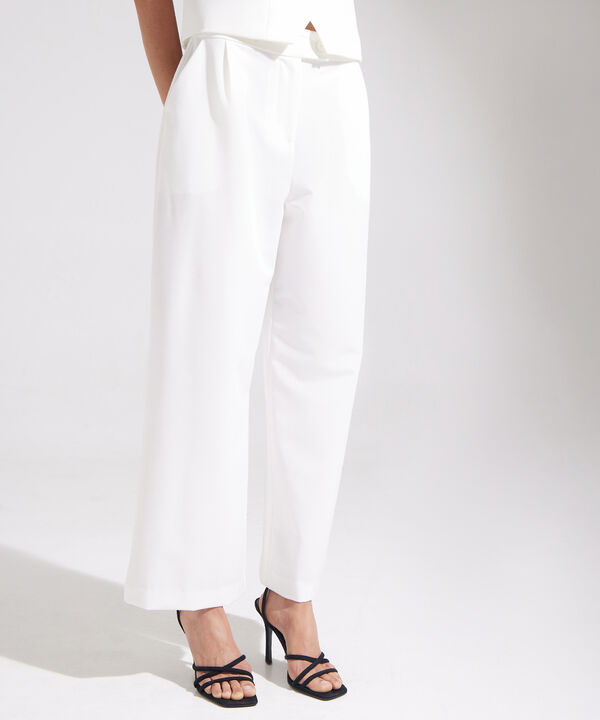 Pantalón Unicolor Con Prense En Frente
