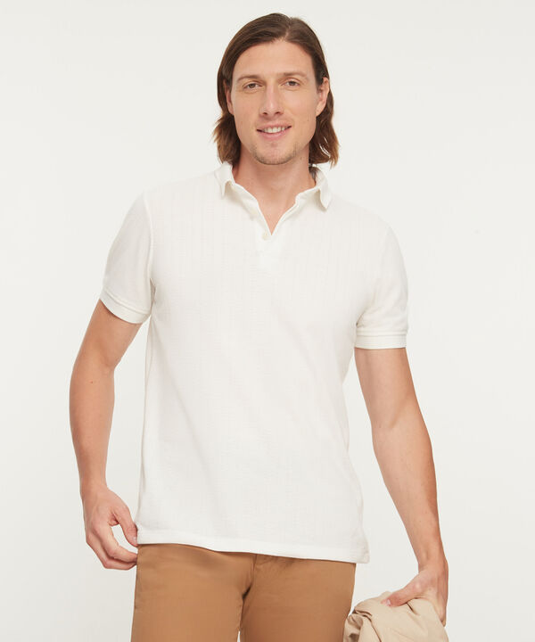 Polo Unicolor Textura Cuello Y Puños Tejidos image number null