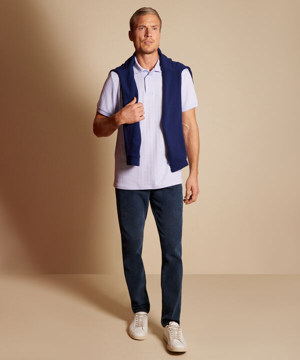 Polo Unicolor Con Textura, Cuello Y Puños Tejidos Sin Bolsillo Y Silueta Regular Fit