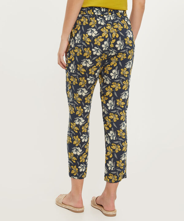 Pantalón Estampado Con Elástico En Cintura, Bolsillos Laterales Y Anudado Decorativo, Líneas