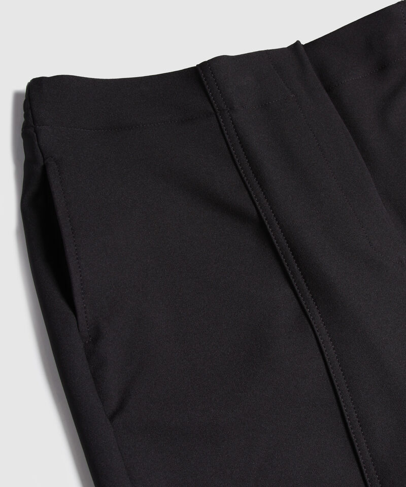 Pantalón Unicolor Con Bolsillos Laterales