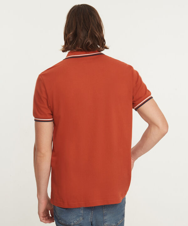 Polo Unicolor Con Bolsillo