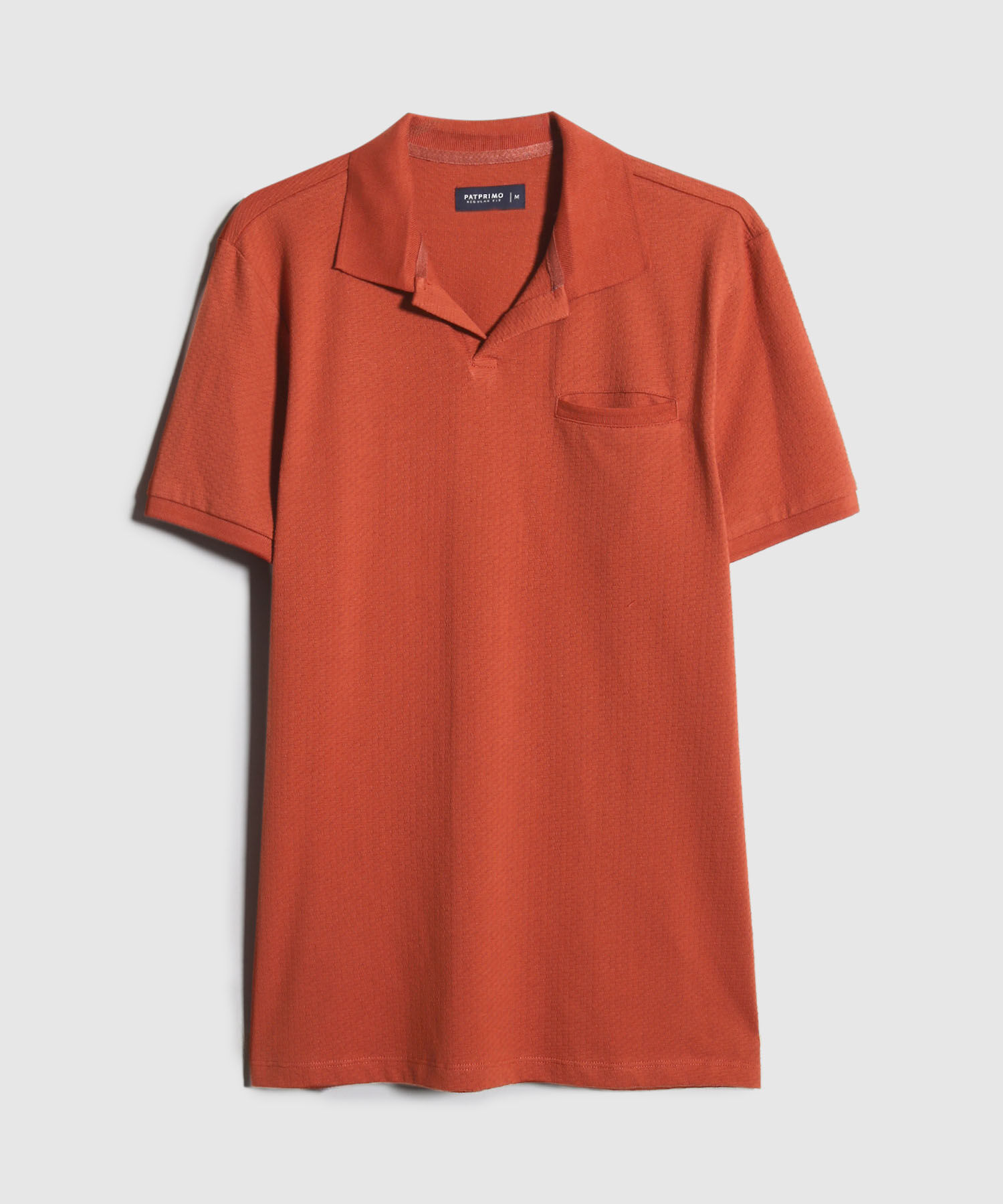 Polo Unicolor Cuello Y Puños Tejidos