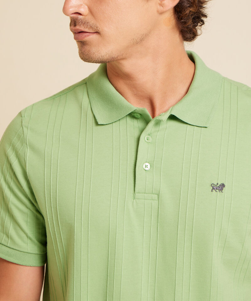 Polo Unicolor Con Textura Cuello Y Pu&ntilde;os Tejidos Sin Bolsillo Con Silueta Regular Fit