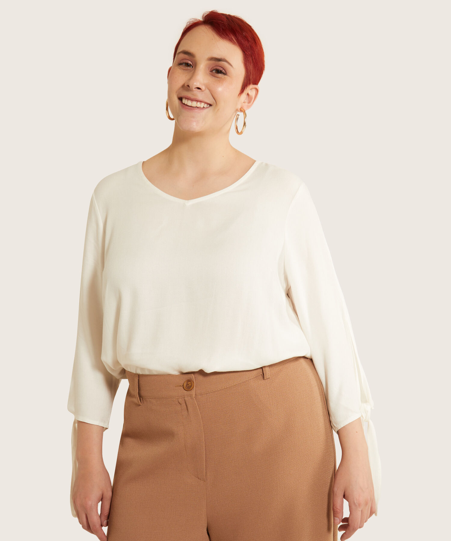 Blusa manga tres cuartos con puño outlet