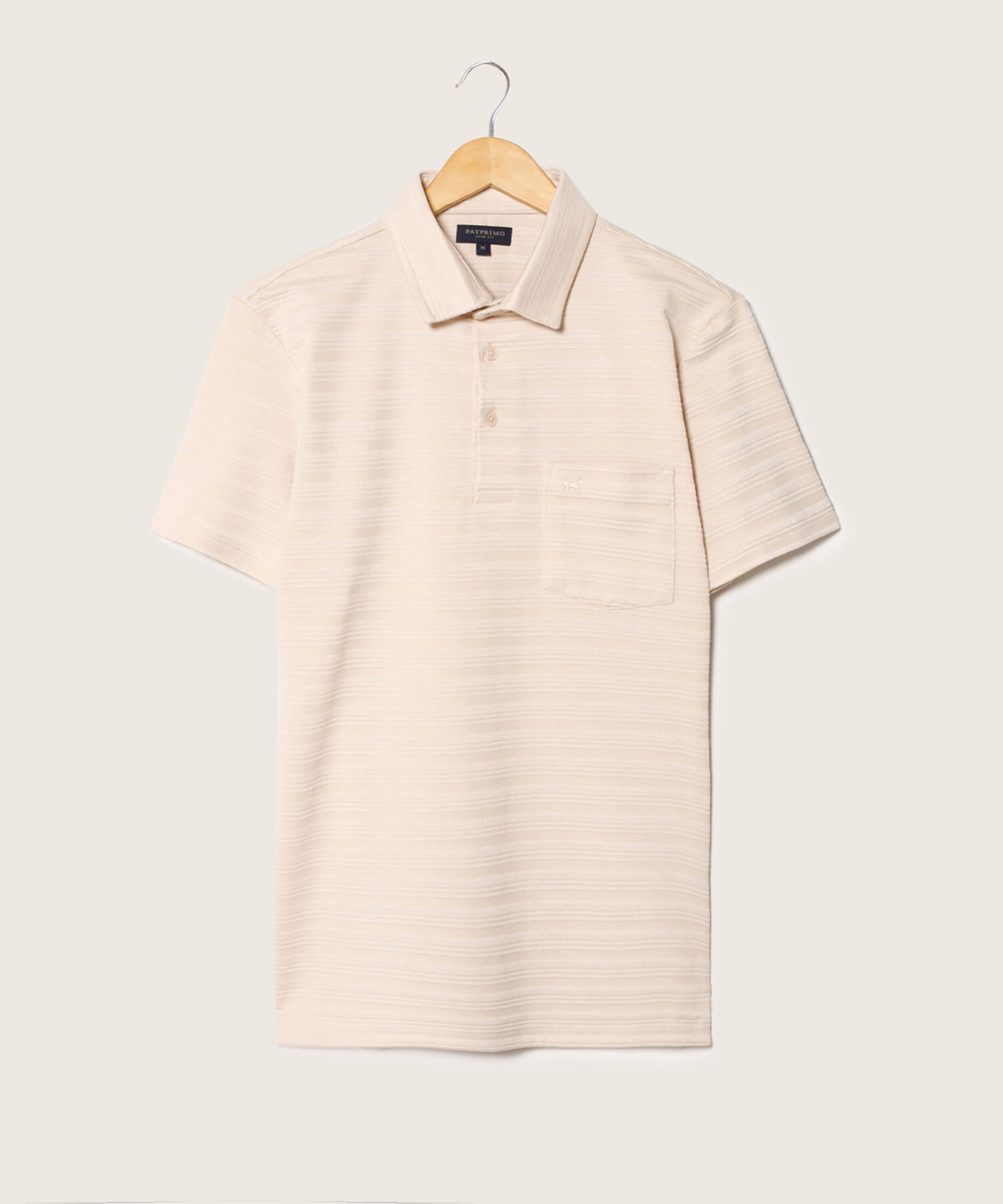 Polo Unicolor Textura, Cuello Maquina Duro Con Bolsillo Y Silueta Slim Fit