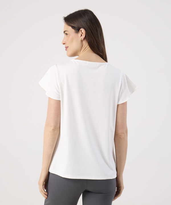 Camiseta Unicolor Con Detalle En Mangas 
