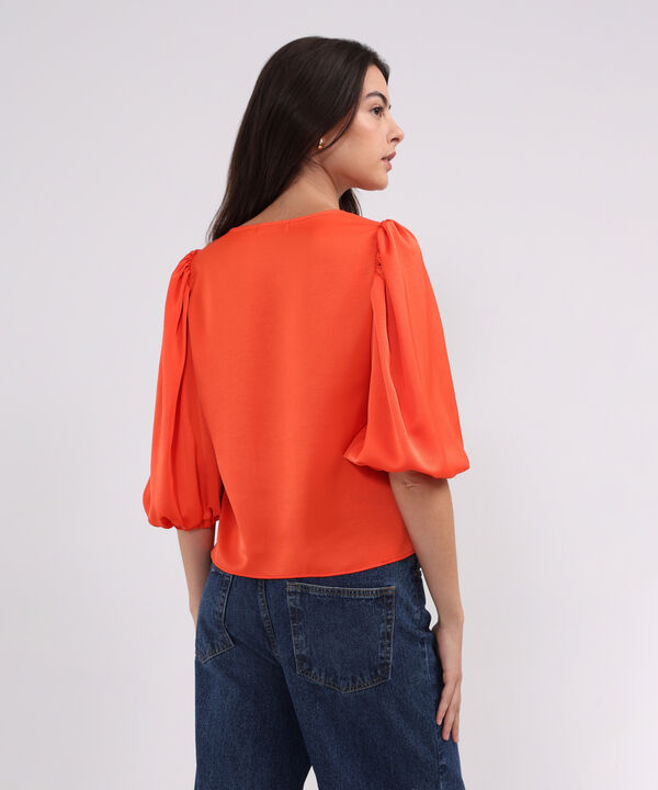 Blusa Escote V Unicolor Con Anudado En Delantero