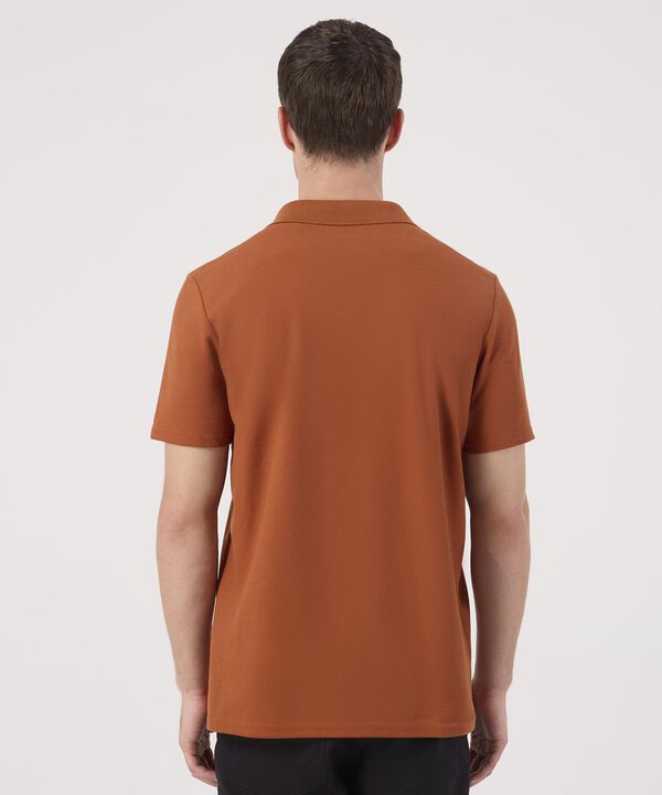 Polo Unicolor Con Bolsillo 