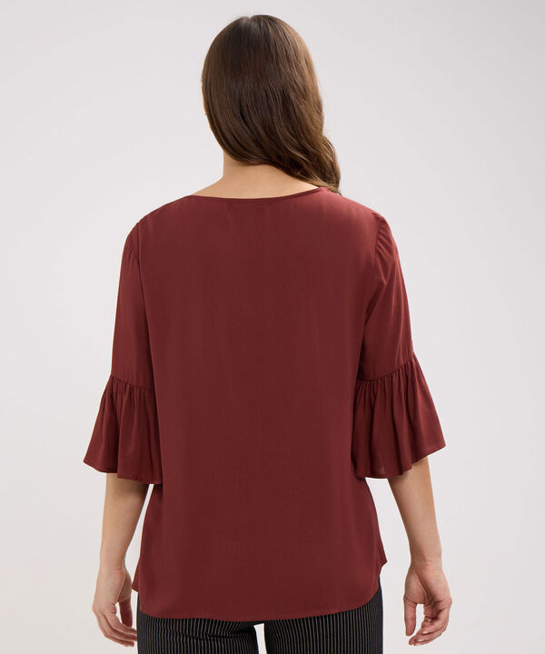 Blusa Escote de Herradura