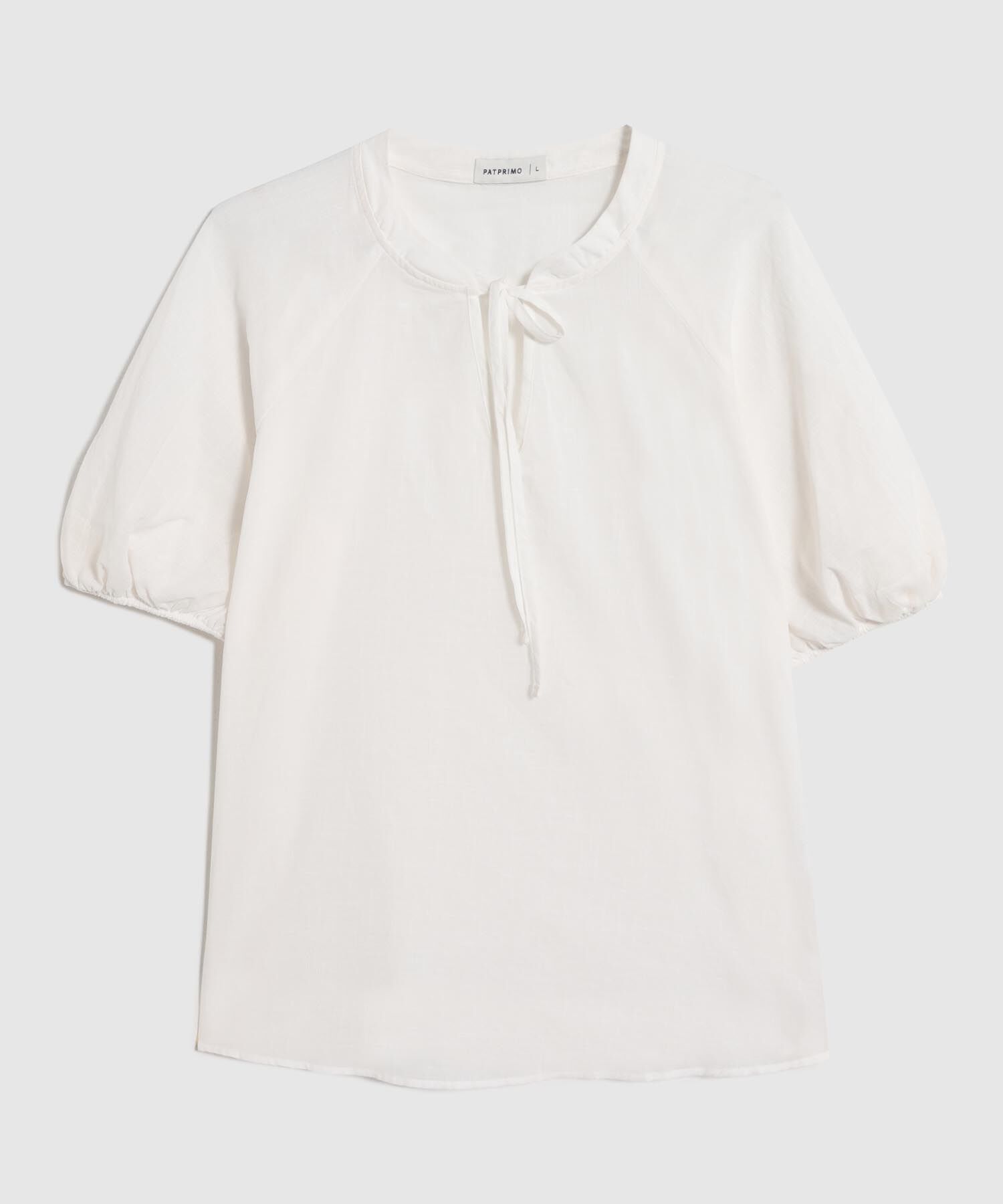 Blusa Unicolor Con Nudo En Cuello 