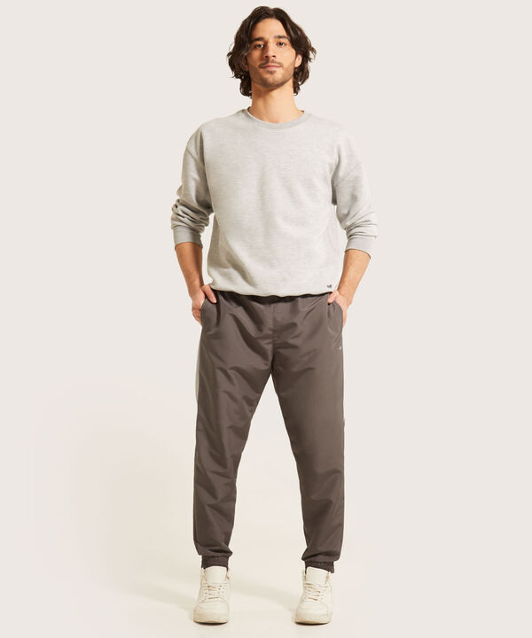 Pantalón Jogger Plano Unicolor Con Cortes Contraste, Bolsillos Laterales, Cordón Ajustable Y Elástico Interno, Sport Líneas image number null