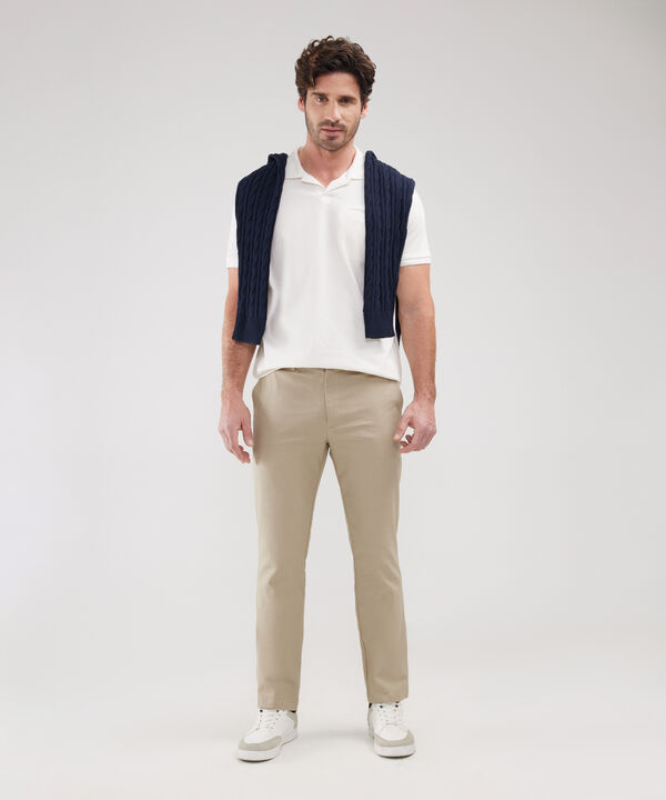 Polo Unicolor Cuello Y Puños Tejidos image number null
