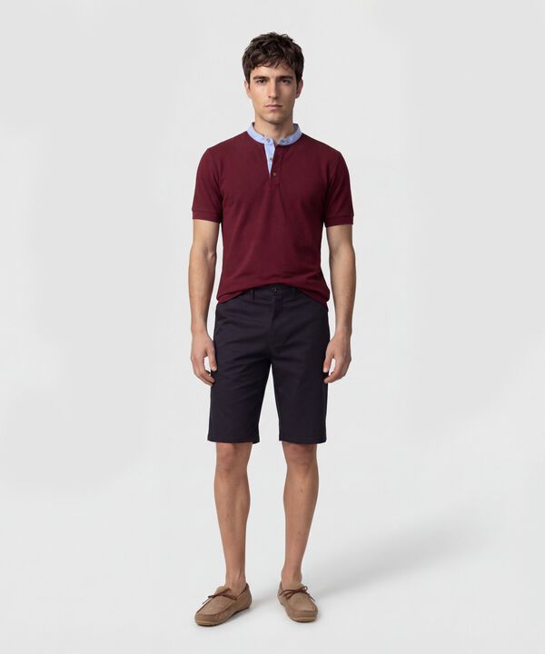 Bermuda Unicolor Con Bolsillos Diagonales 