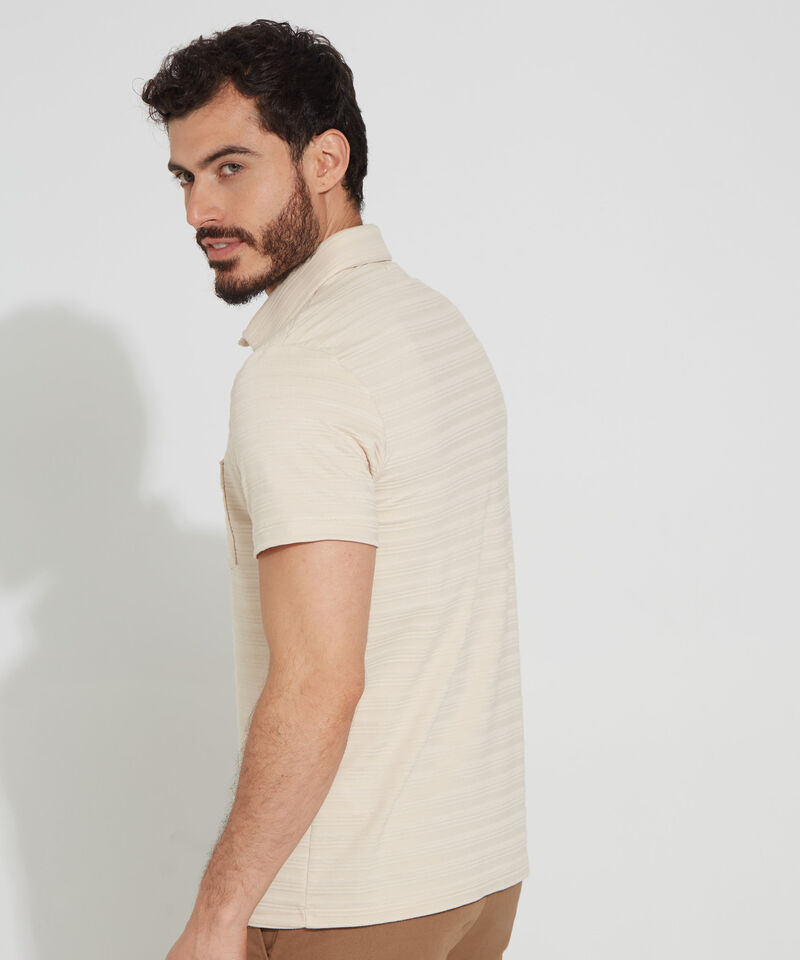 Polo Unicolor Textura, Cuello Maquina Duro Con Bolsillo Y Silueta Slim Fit