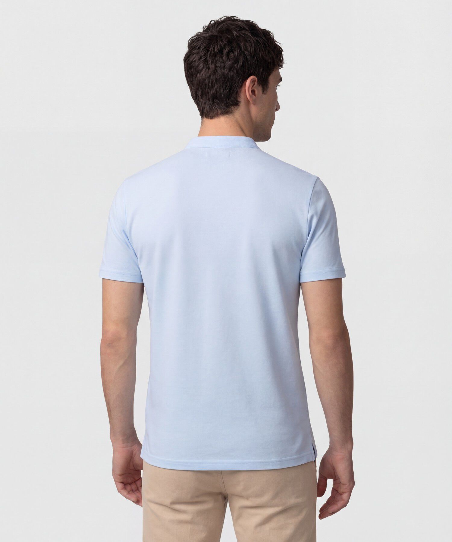 Polo Unicolor Con Bordado