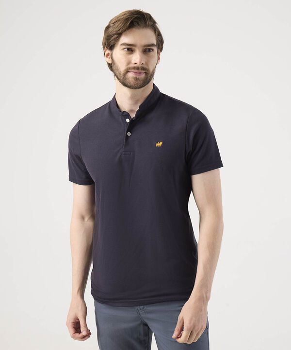 Polo Unicolor Con Bordado image number null