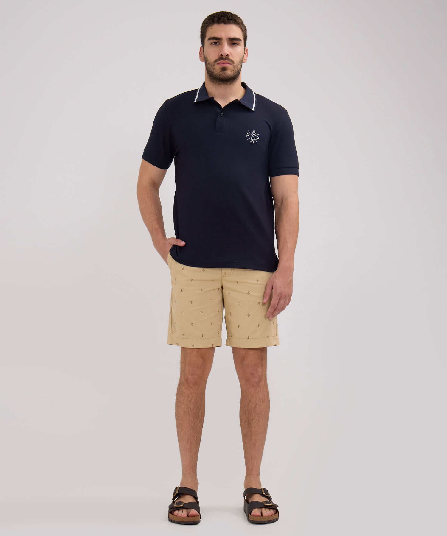 Polo Unicolor Con Bordado