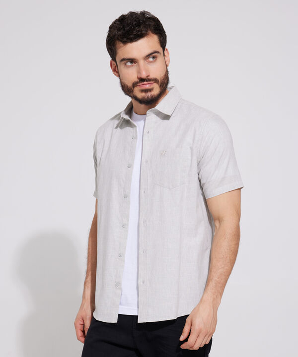 Camisa Unicolor Manga Corta Con Bolsillo Y Silueta Slim Fit image number null