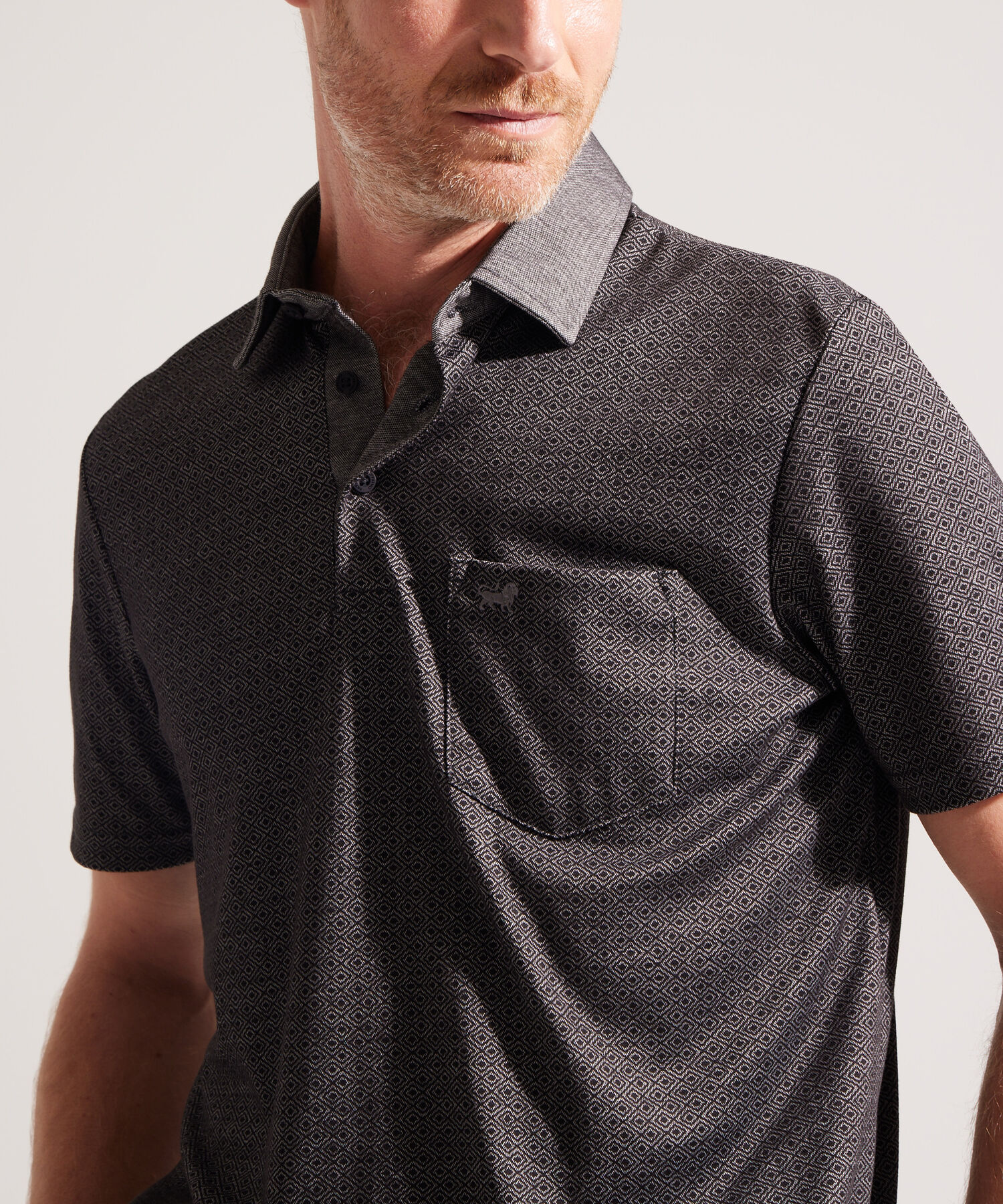 Polo Estampada con Bolsillo