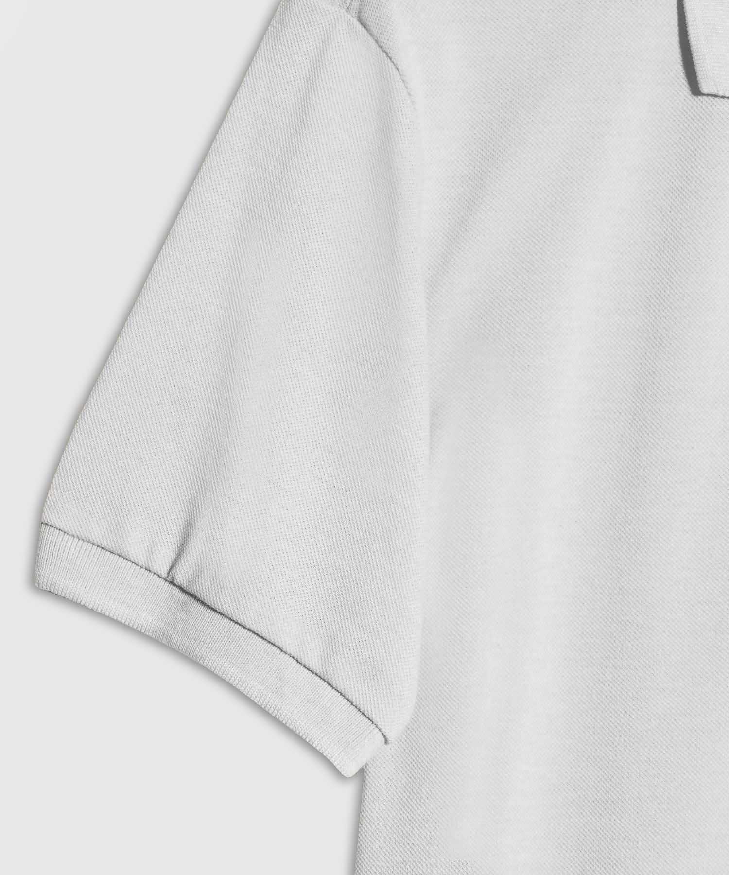 Polo Tejido Unicolor Cuello Y Puños Tejidos,Sin Bolsillo Con Hiladillo.