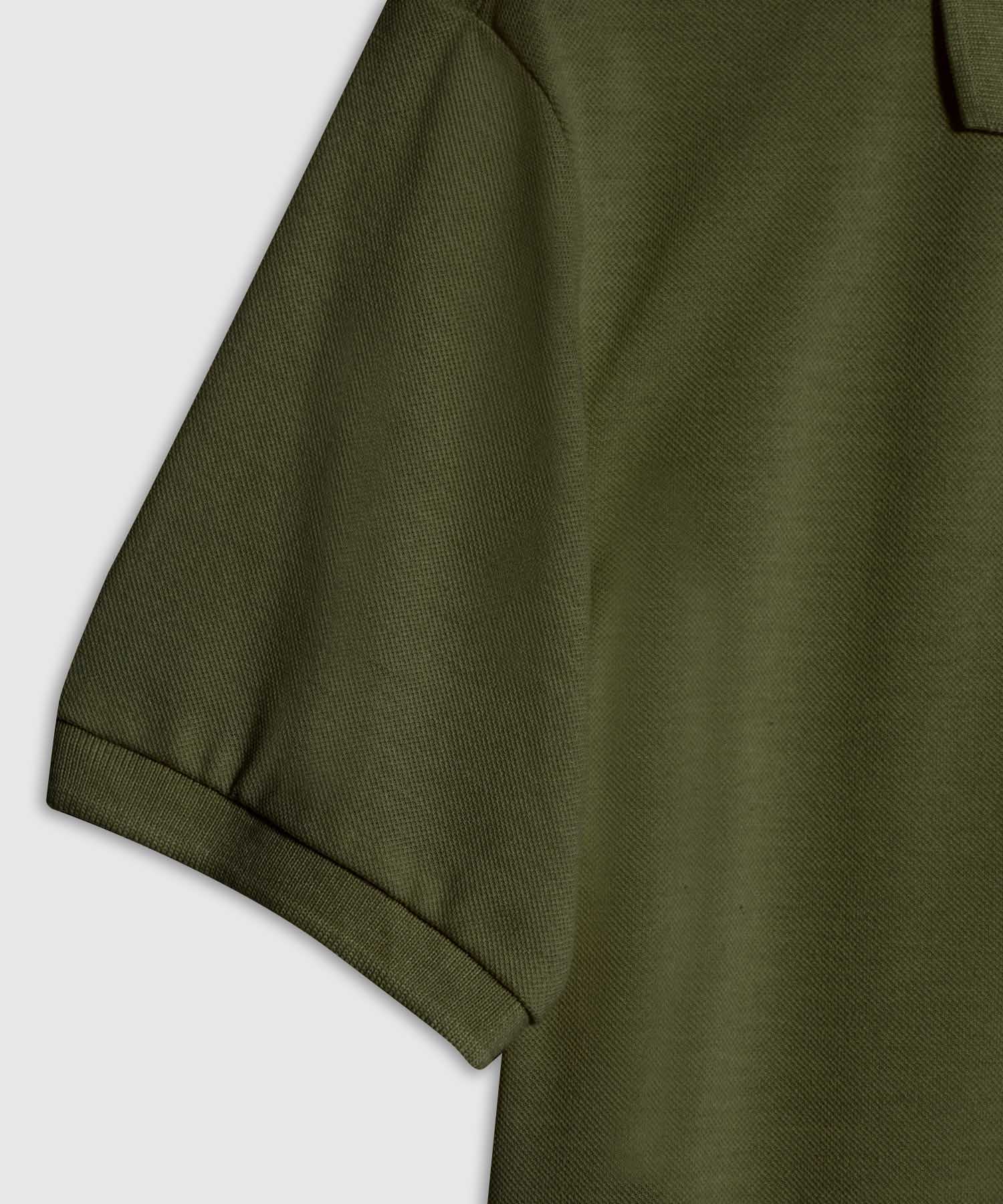 Polo Tejido Unicolor Cuello Y Puños Tejidos,Sin Bolsillo Con Hiladillo.
