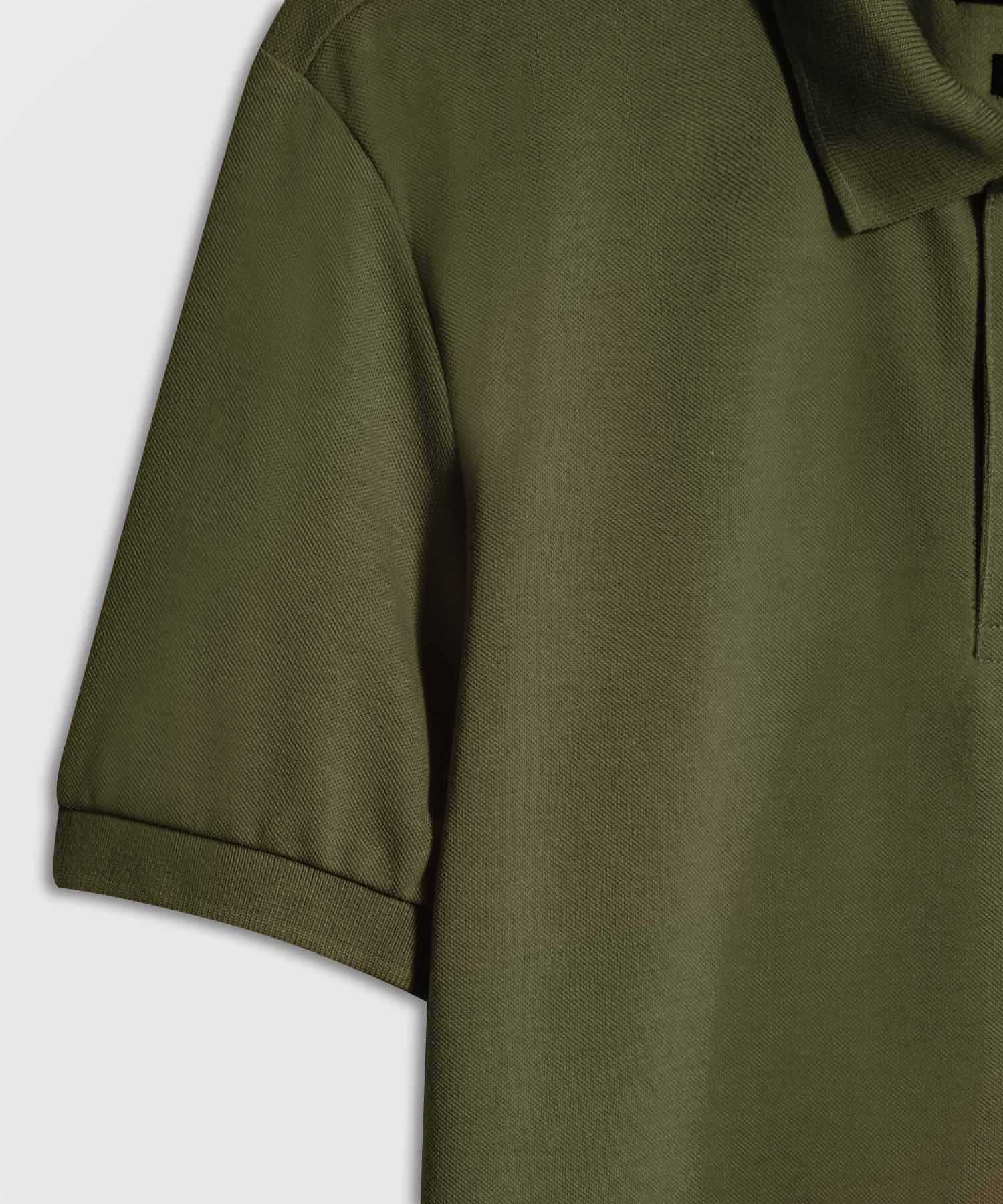 Polo Tejido Unicolor Cuello Y Puños Tejidos,Sin Bolsillo Con Hiladillo.