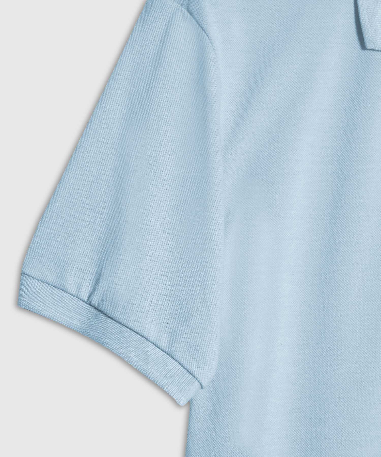 Polo Tejido Unicolor Cuello Y Puños Tejidos,Sin Bolsillo Con Hiladillo.