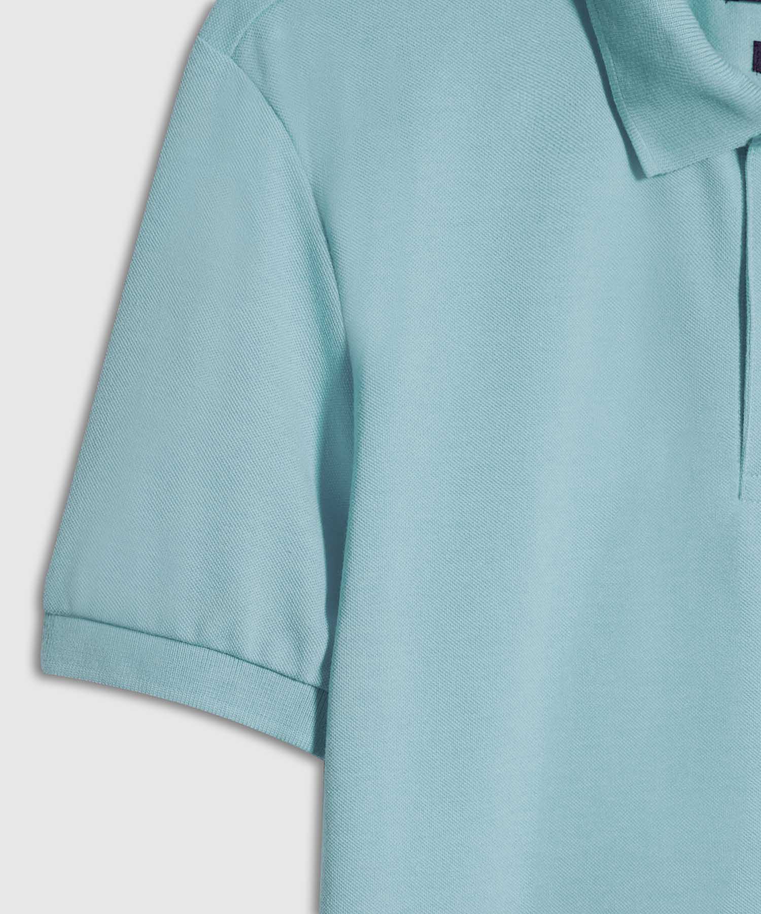 Polo Tejido Unicolor Cuello Y Puños Tejidos,Sin Bolsillo Con Hiladillo.